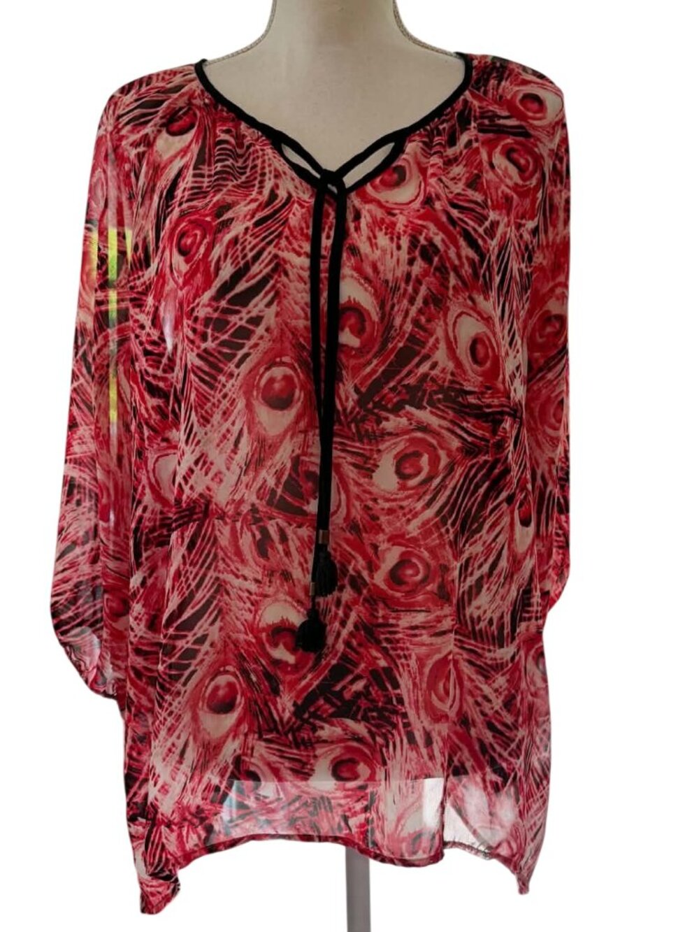 Zac & Rachel sheer chiffon peasant blouse featuring a bold, vibrant print.